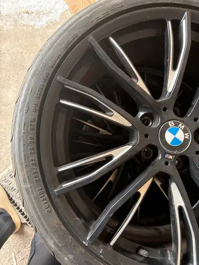 These 255/35 ZR 20 tires and BMW alloy wheels are pre-owned and in good condition, ready to elevate...