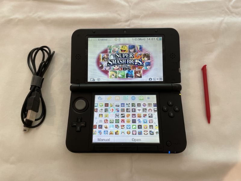 3DS XL + Almost 2000 + Games + 128GB SD Card + Power Adapter Upg
