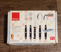 Brand New In box 40 Pc. Utensil Flatware Set$65