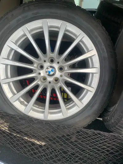 Set of 4 bmw 18 inch rims. In great shape. No longer own the car. Was a 3 series all I know.