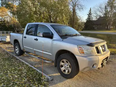 I am selling my 2005 Nissan Titan for $1800 or best offer. The body has rust but the truck runs grea...