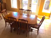 Solid oak table with chairs