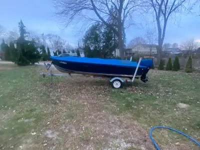16 ft Sylvan with live well, Helix 5 and snap on Cover. Motor is long shaft, electric start and low...