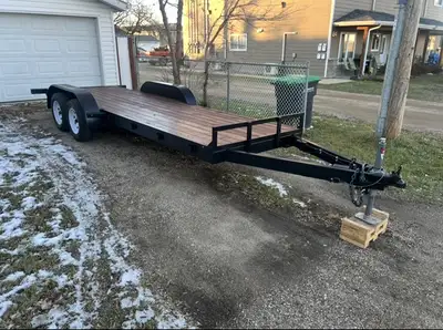 Tandem axle utility trailer. 5.5ft x 18ft. Torsion bar axles. Tows excellent. Recently refurbished....