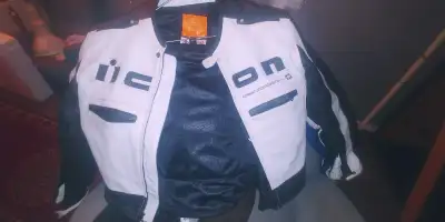 This is an Icon motorcycle jacket, perfect for any rider looking for protection and style. This jack...