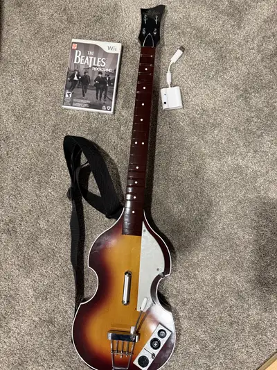 Excellent condition Nintendo wii Beatles wireless rock band guitar with dongle and game tested and e...