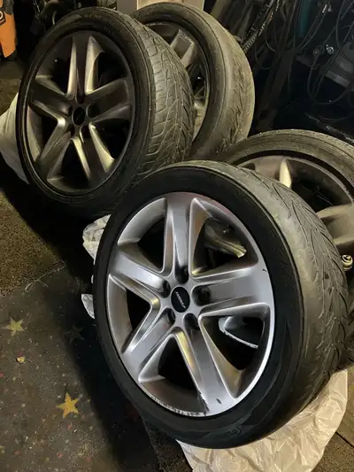 Four rims 5/112/18 , little curbs damage ,tires one is ok, two only 25% tread remain ,one is O