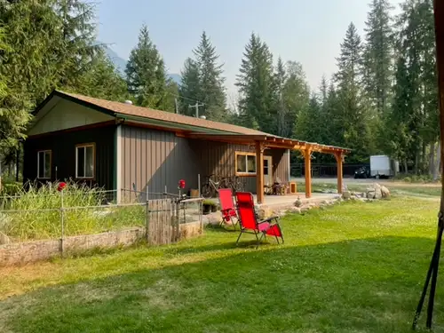 3.19 Acres with Multiple Homes, Cabins, Workshops, Creek Frontage and Exceptional Potential. A rare...