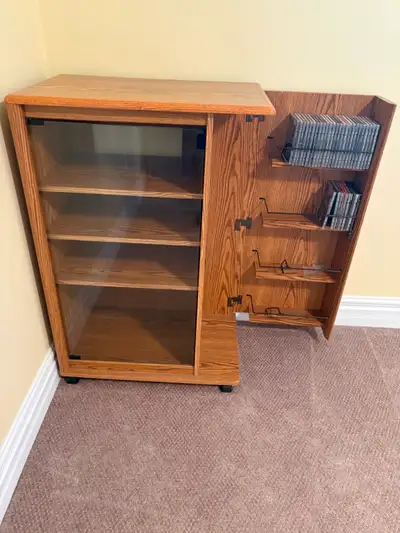 Stereo cabinet with side door to keep CDs and DVDs., View more