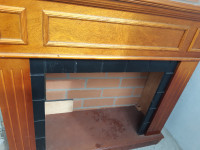 wooden fireplace mantel in good condition
