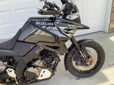 Comes with, dominator slip on muffler, adjustable windsheild extender, car sounding horn. Oil and fi...