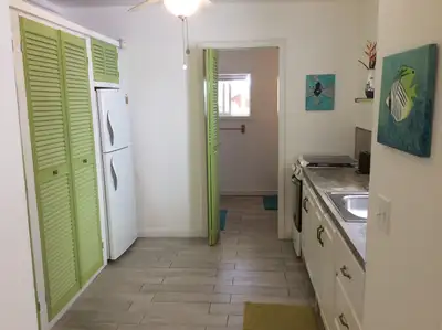 Perfect location , just a few minutes walk to the beach & West Bay Mall . Located on a short street...