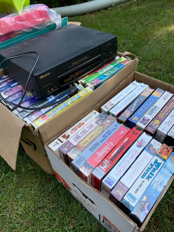Two Massive Boxes of Disney and Family VHS Tapes with VHS Player Arts