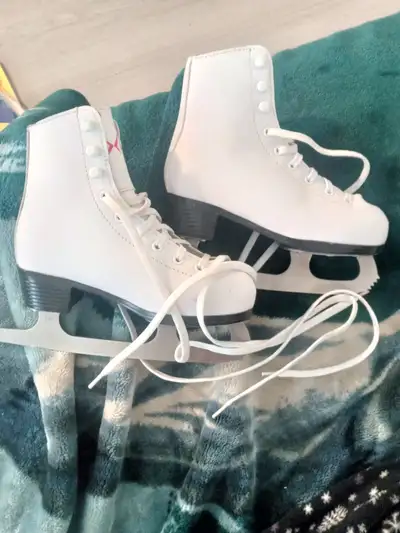Kids ice skates like new., View more