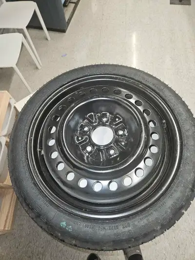 FIRESTONE unused. T115 70R16 Tire and Rim