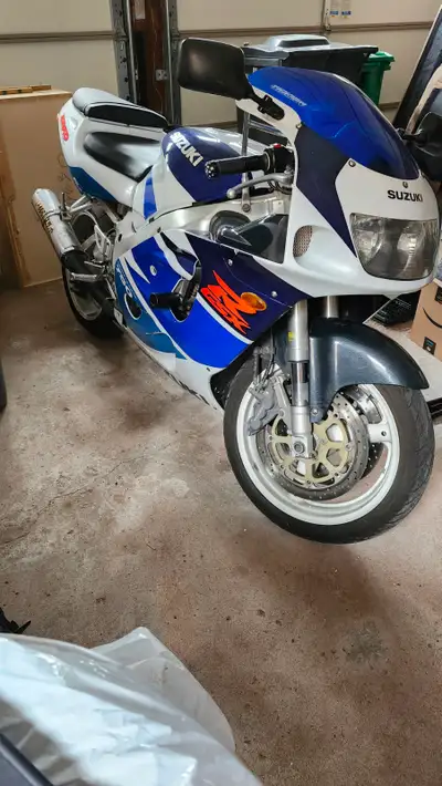 Selling privately 1998 Suzuki GSX-R750 SRAD. Great shape and ready to ride in the spring. Selling fo...