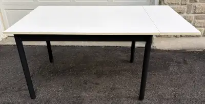 White dining table with extendable panel, View more
