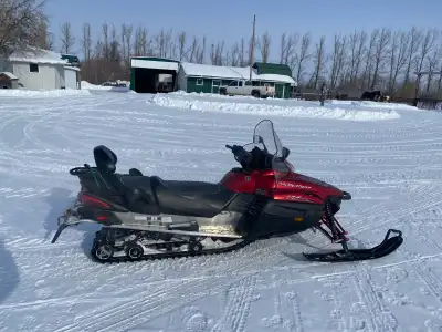 2 up, reverse, electric start, hand warmers, tarp, 4 stroke. Very good shape.