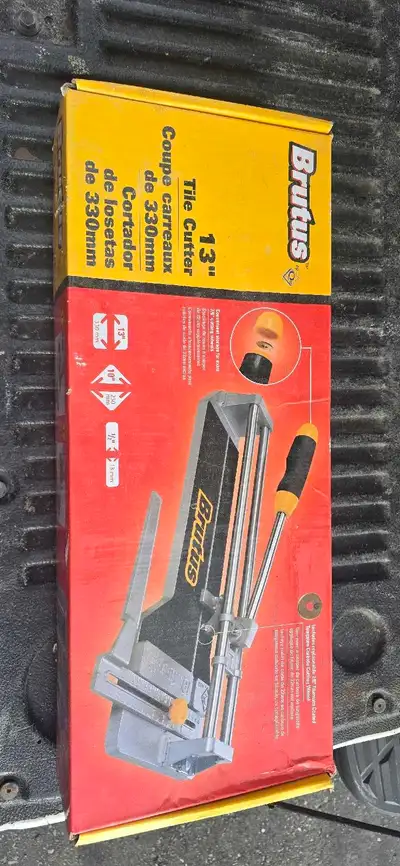 This is a Brutus 13" tile cutter, perfect for cutting tiles up to 13 inches. It's in used condition,...
