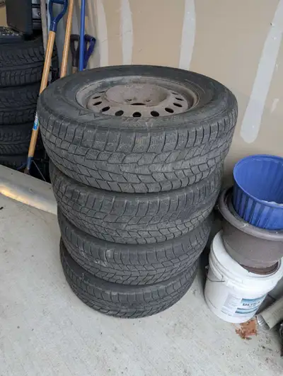 A set of 4 "Motomaster Winter Edge" winter tires used for two seasons with steel rims with wheel bol...