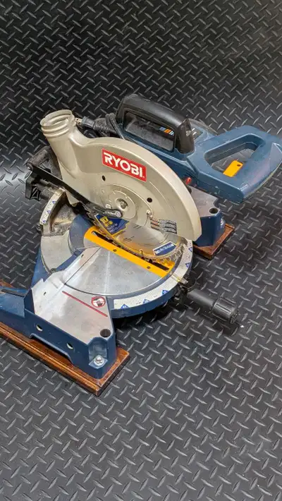 This pre-owned Ryobi 10-inch miter saw comes paired with a sturdy Mastercraft folding stand to tackl...