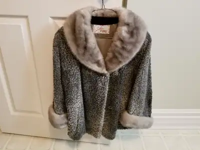 Gray Persian lamb with fur trim on cuffs and collar. Fur is real Not sure of size, there's no tag.