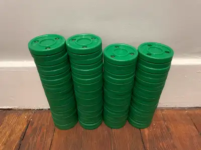 Green Biscuit hockey pucks, View more