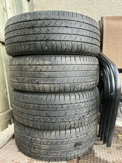 Durable Michelin Green X radial tires in size P245/60R18. These tires have a 104H load and speed rat...