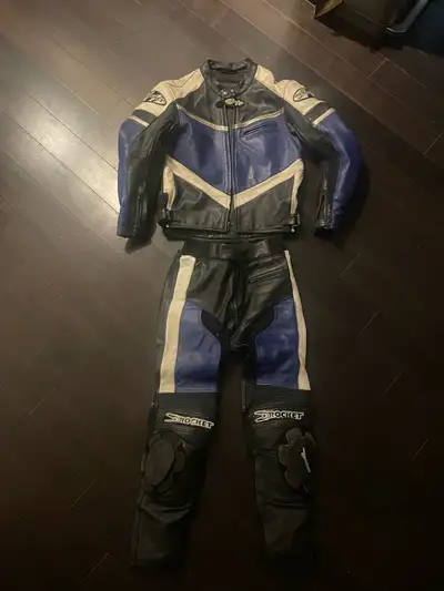 I'm selling a Joe Rocket 2-piece leather motorcycle suit. This used suit features durable leather co...