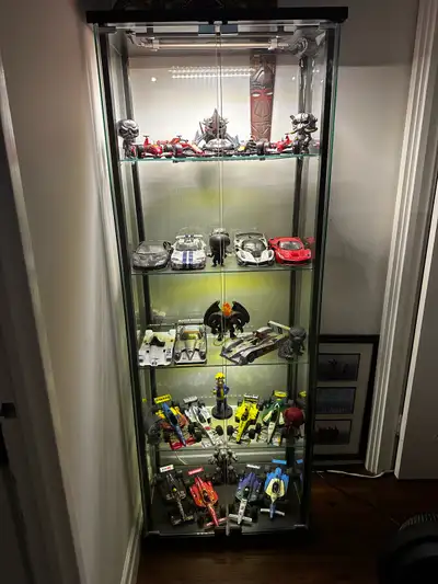  Glass Cabinet with Collectibles, View more