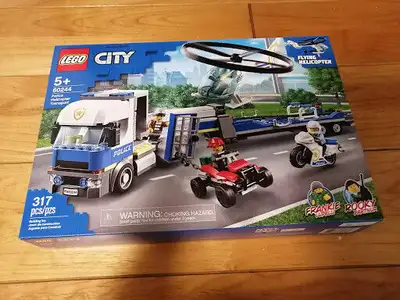 I am offering for sale a brand new Lego City 60244 Police Helicopter Transport, it has 317pcs. It's...