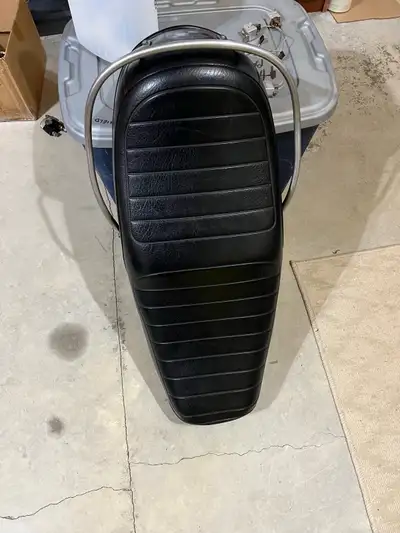 Used /7 seat, fits many years, good useable condition, including rail, and hinges, pickup in Elora o...