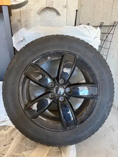 Get your vehicle ready for the season with this set of four 225/55R17 97H winter tires mounted on ge...