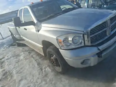 180600 KM Laramie Dually. Automatic. No blow by. Expanded metal tail gate. 5th wheel rails and hitch...