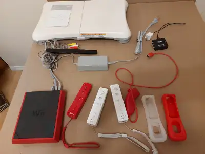 Wii mini for sale Comes with three controllers and one nunchuk Includes two silicone controller cove...
