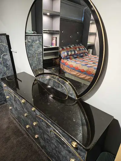 This elegant, used, vintage bedroom set features a unique black and grey marble-look finish with gol...