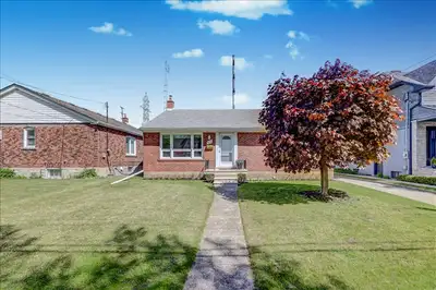 This classic 3-bedroom rec brick home is nestled on a quiet, tree-lined street in the desirable Nors...