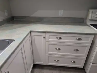 lower kitchen cabinets with countertop sink and faucet , View more