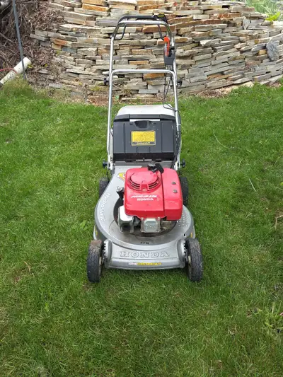 Honda self propeeled 21 inch, 5 hp