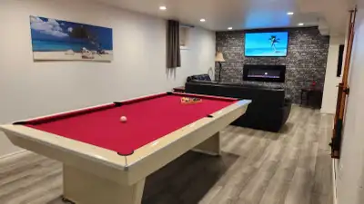 Come Celebrate the Holidays with Family and Friends in our Lakefront Five Bedroom Cottage. Spacious...