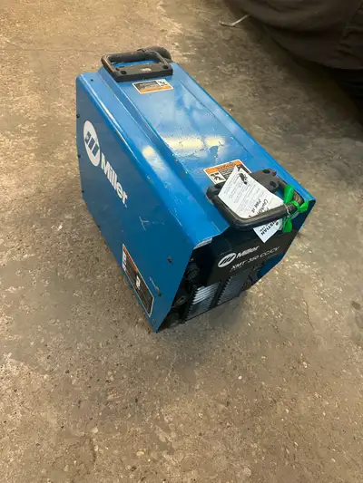 Miller XMT 350 inverter welder. Run any wire feeder off this welder. Great shop or garage machine. C...