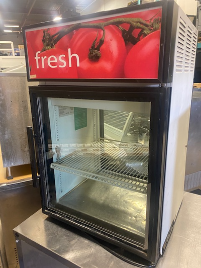 You are viewing a used True GDM-05PT Countertop Commercial Pass through glass Door Cooler. There is...