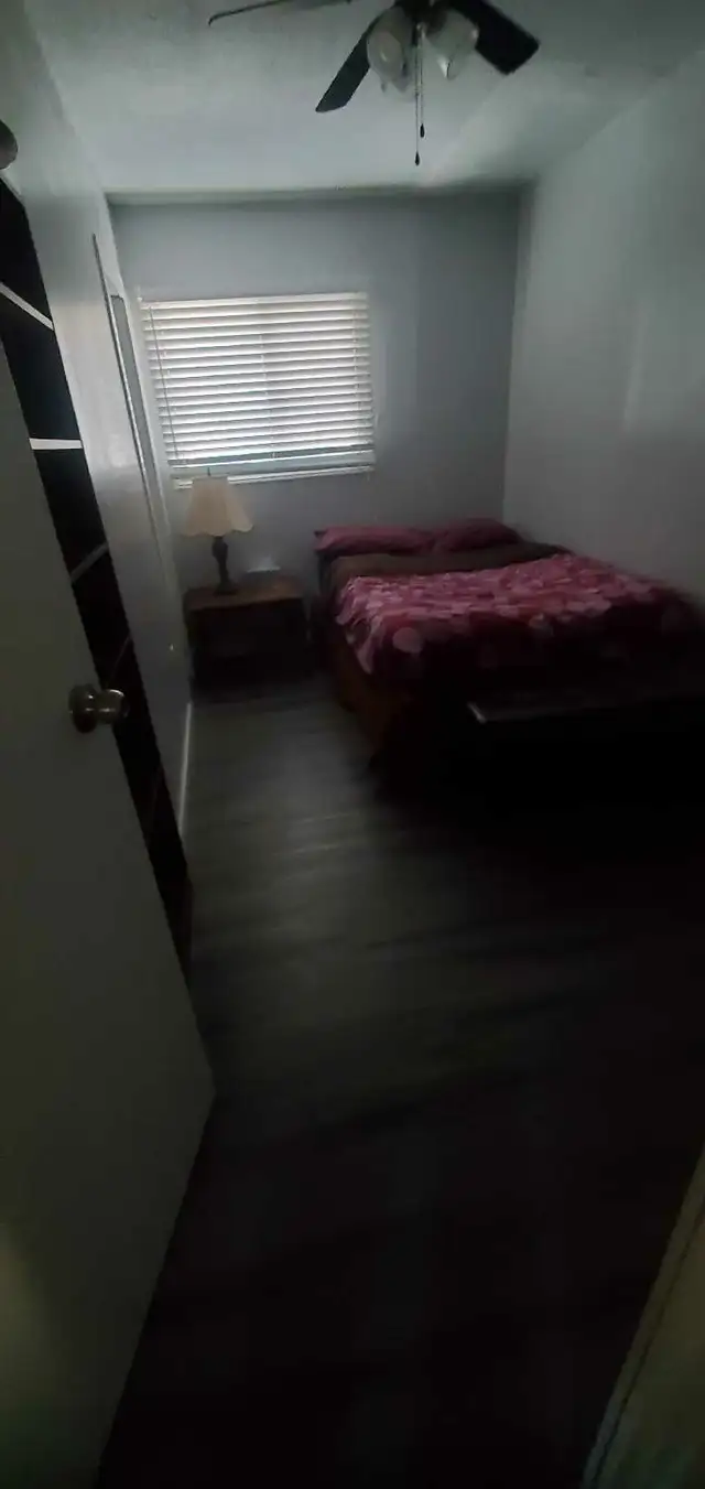 CLEAN ROOM FOR ONE IN FRENCH CANADIAN HOUSEHOLD