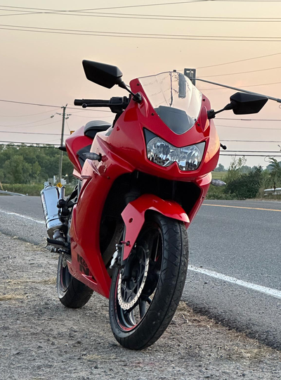 Bought this beautiful red Ninja 250 in June 2025. Rode this bike a bunch last year and it has been g...