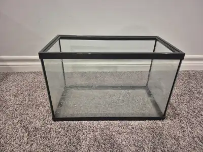 Selling this 5-gallon aquarium. It still holds water perfectly and features black silicone seals. Th...