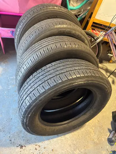 Set of 4 used 225/65R17 tires for sale. Includes 2 Firestone tires and 2 Kumho tires. Message me if...