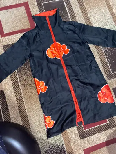 This is a Itachi Akasuki Cloak and Handband from the anime Naruto. It is well for children and amazi...
