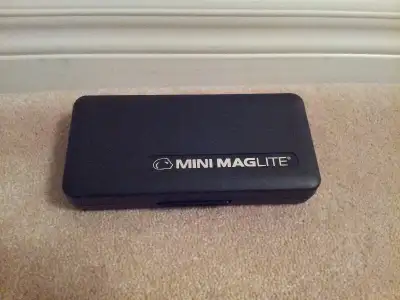 I have for sale a Mini MagLite case. Plastic case for storing or traveling with your Mini MagLite. M...