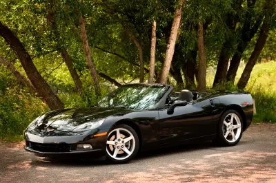 Experience the thrill of driving this pristine 2005 Corvette Convertible, a black-on-black classic t...