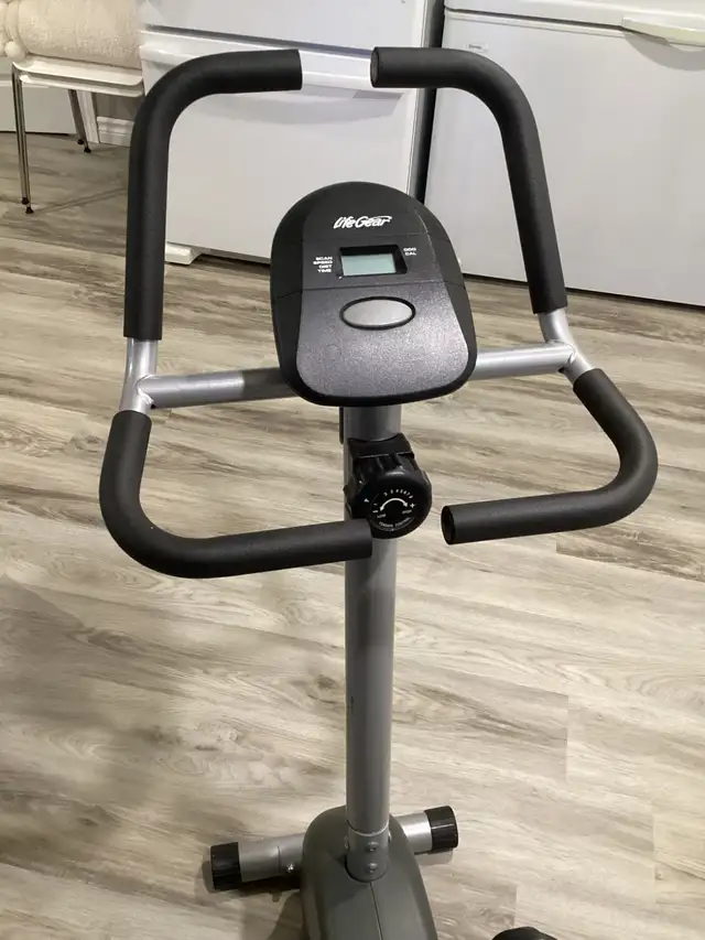 stationary exercise bicycle598239572048619521